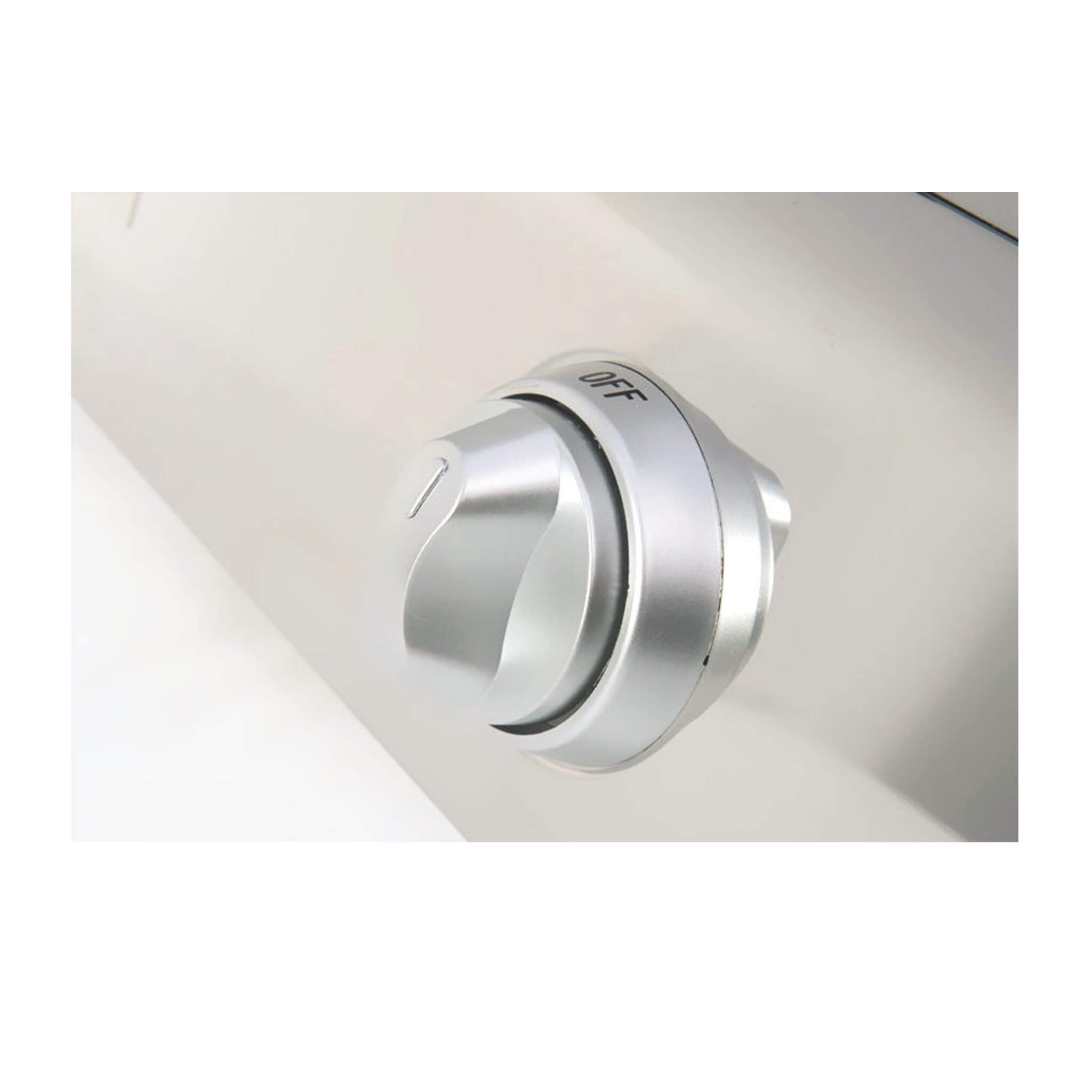 Silver control knob on a gas stove appliance
