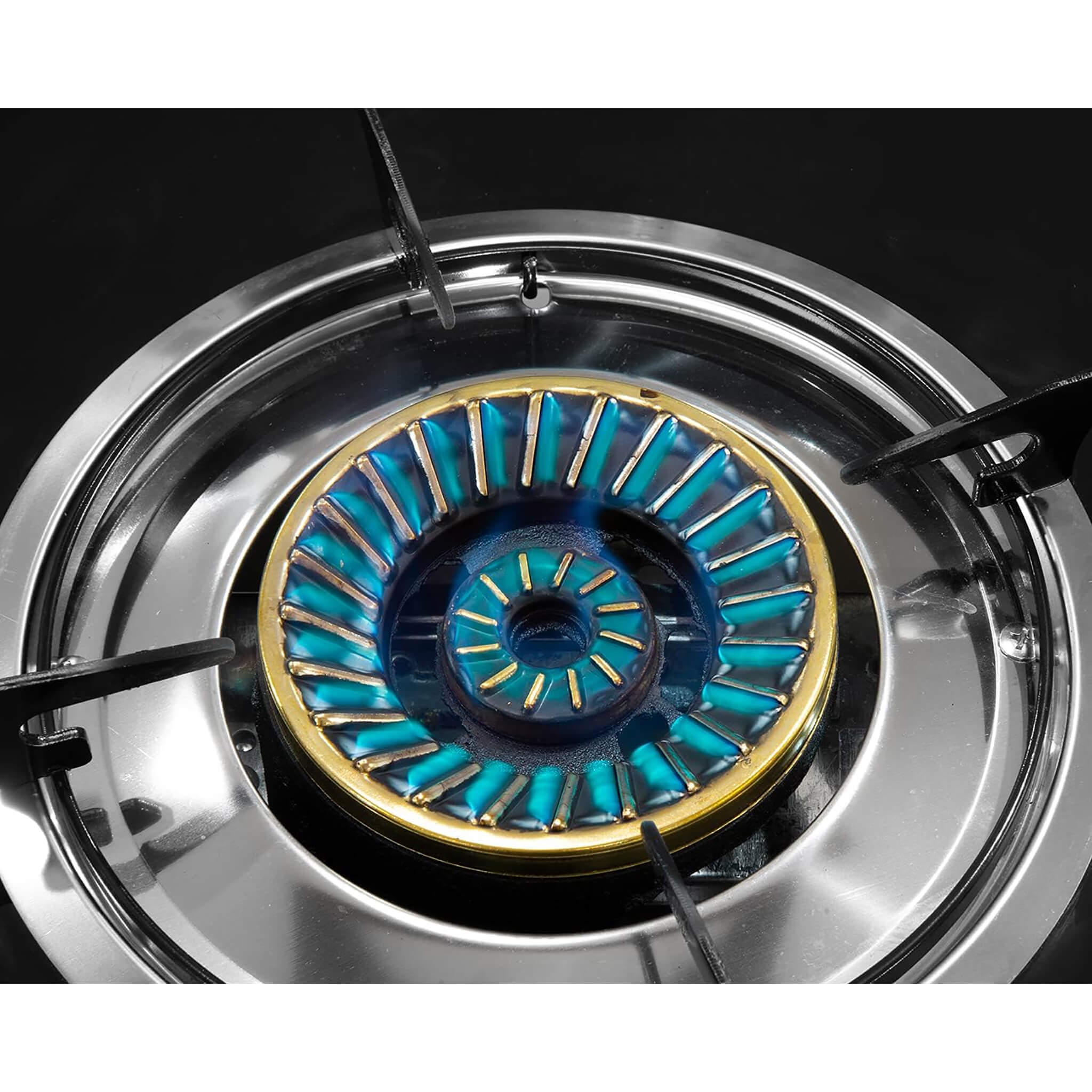 Close-up of a gas stove burner with blue flame